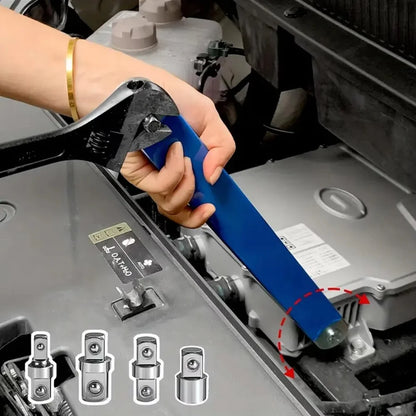 Hand using the ratchet wrench extension bar with rotating adapter on a car battery